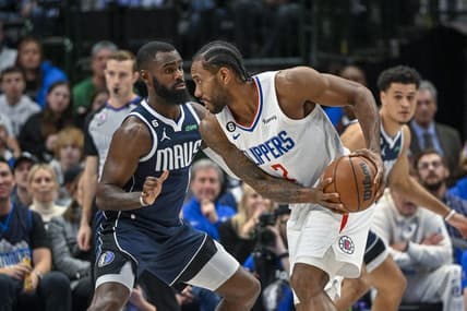 Jan 22, 2023; Dallas, Texas, USA; LA Clippers forward Kawhi Leonard (2) looks to move the ball past Dallas Mavericks forward Tim Hardaway Jr. (11) during the first half at the American Airlines Center. Mandatory Credit: Jerome Miron-USA TODAY Sports