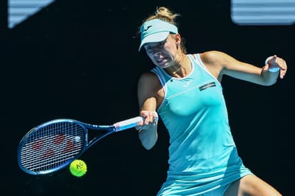 Jan 23, 2023; Melbourne, Victoria, Australia; Magda Linette from Poland during her round four match against Caroline Garcia from France on day eight of the 2023 Australian Open tennis tournament at Melbourne Park. Mandatory Credit: Mike Frey-USA TODAY Sports