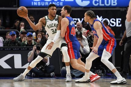 Jan 23, 2023; Detroit, Michigan, USA; Milwaukee Bucks forward Giannis Antetokounmpo (34) looks to pass the ball while being pressured by Detroit Pistons forward Bojan Bogdanovic (44) in the first quarter at Little Caesars Arena. Mandatory Credit: Lon Horwedel-USA TODAY Sports