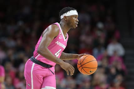 Jan 24, 2023; Fayetteville, Arkansas, USA; Arkansas Razorbacks guard Davonte Davis (4) dribbles during the first half against the LSU Tigers at Bud Walton Arena. Mandatory Credit: Nelson Chenault-USA TODAY Sports