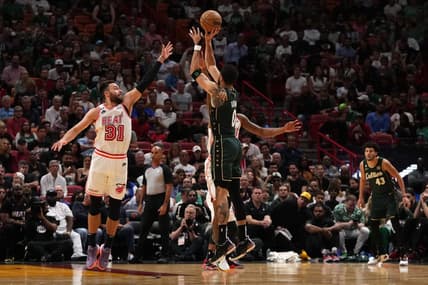 Jan 24, 2023; Miami, Florida, USA; Boston Celtics forward Jayson Tatum (0) attempts a three point shot over Miami Heat guard Max Strus (31) during the first half at Miami-Dade Arena. Mandatory Credit: Jasen Vinlove-USA TODAY Sports