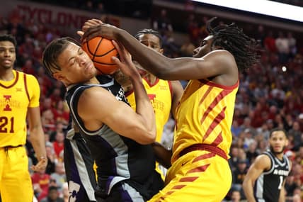 Jan 24, 2023; Ames, Iowa, USA; Iowa State Cyclones forward Robert Jones (12) and Kansas State Wildcats forward Keyontae Johnson (11) battle for a rebound during the second half at James H. Hilton Coliseum. The Cyclones won 80-76. Mandatory Credit: Reese Strickland-USA TODAY Sports