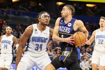 Jan 25, 2023; Orlando, Florida, USA;  Indiana Pacers guard Chris Duarte (3) drives to the hoop guarded by Orlando Magic center Wendell Carter Jr. (34) in the first quarter at Amway Center. Mandatory Credit: Nathan Ray Seebeck-USA TODAY Sports