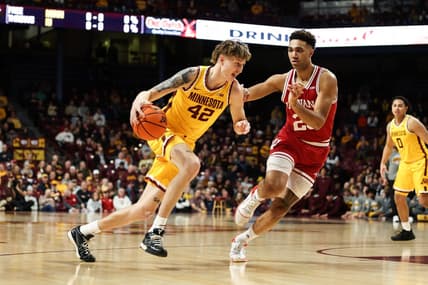 Jan 25, 2023; Minneapolis, Minnesota, USA; Minnesota Golden Gophers center Treyton Thompson (42) dribbles to the basket while Indiana Hoosiers forward Trayce Jackson-Davis (23) defends during the first half at Williams Arena. Mandatory Credit: Matt Krohn-USA TODAY Sports