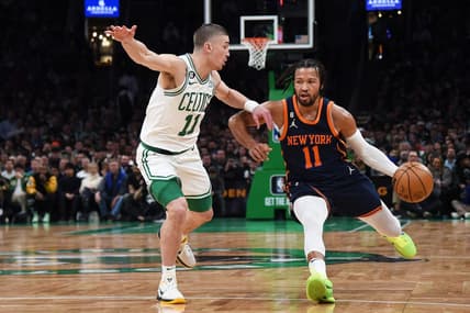 Jan 26, 2023; Boston, Massachusetts, USA;  New York Knicks guard Jalen Brunson (11) controls the ball while Boston Celtics guard Payton Pritchard (11) defends during the second half at TD Garden. Mandatory Credit: Bob DeChiara-USA TODAY Sports
