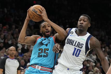 Jan 26, 2023; Phoenix, Arizona, USA; Phoenix Suns forward Mikal Bridges (25) drives on Dallas Mavericks forward Dorian Finney-Smith (10) in the first half at Footprint Center. Mandatory Credit: Rick Scuteri-USA TODAY Sports