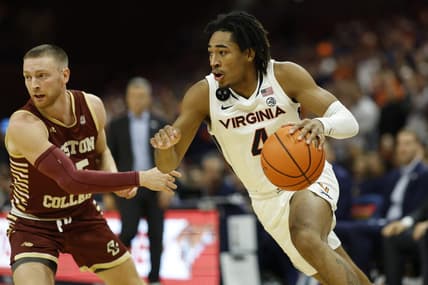 Jan 28, 2023; Charlottesville, Virginia, USA; Virginia Cavaliers guard Armaan Franklin (4) drives to the basket as Boston College Eagles guard Mason Madsen (45) defends in the second half at John Paul Jones Arena. Mandatory Credit: Geoff Burke-USA TODAY Sports