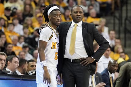 Jan 28, 2023; Columbia, Missouri, USA; Missouri Tigers guard Sean East II (55) and head coach Dennis Gates look on during the second half against the Iowa State Cyclones at Mizzou Arena. Mandatory Credit: Denny Medley-USA TODAY Sports