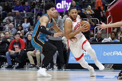 Jan 28, 2023; Detroit, Michigan, USA;  Houston Rockets guard Eric Gordon (10) dribbles on Detroit Pistons guard Killian Hayes (7) in the first half at Little Caesars Arena. Mandatory Credit: Rick Osentoski-USA TODAY Sports