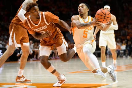Tennessee guard Zakai Zeigler (5) dribbles as Texas guard Artery Morris (2) defends during a game between Tennessee and Texas at Thompson-Boling Arena in Knoxville, Tenn., on Saturday, Jan. 28, 2023.

Kns Ut Basketball Vs Texas