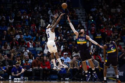 Jan 28, 2023; New Orleans, Louisiana, USA;  Washington Wizards guard Bradley Beal (3) shoots a jump shot over New Orleans Pelicans center Jonas Valanciunas (17) during the first half at Smoothie King Center. Mandatory Credit: Stephen Lew-USA TODAY Sports