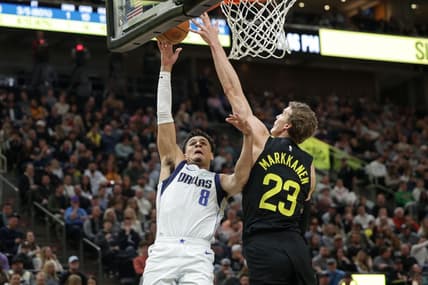 Jan 28, 2023; Salt Lake City, Utah, USA;  Utah Jazz forward Lauri Markkanen (23) blocks the shot of Dallas Mavericks guard Josh Green (8) during the second quarter at Vivint Arena. Mandatory Credit: Chris Nicoll-USA TODAY Sports