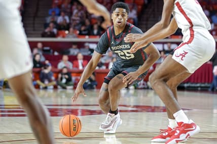 Oklahoma guard Grant Sherfield (25) looks to pass in the first half during a basketball game between The Oklahoma Sooners (OU) and The Alabama Crimson Tide at the Lloyd Noble Center in Norman, Okla., Saturday, Jan. 28, 2023.

cover small