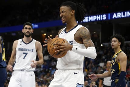 Jan 29, 2023; Memphis, Tennessee, USA; Memphis Grizzlies guard Ja Morant (12) reacts during the second half against the Indiana Pacers at FedExForum. Mandatory Credit: Petre Thomas-USA TODAY Sports