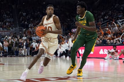 Jan 30, 2023; Austin, Texas, USA; Texas Longhorns guard Sir'Jabari Rice (10) drives to the basket against Baylor Bears forward Josh Ojianwuna (15) during the first half at Moody Center. Mandatory Credit: Scott Wachter-USA TODAY Sports