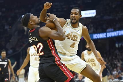 Jan 31, 2023; Cleveland, Ohio, USA; Cleveland Cavaliers forward Evan Mobley (4) defends Miami Heat forward Jimmy Butler (22) in the second quarter at Rocket Mortgage FieldHouse. Mandatory Credit: David Richard-USA TODAY Sports