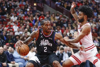 Jan 31, 2023; Chicago, Illinois, USA; LA Clippers forward Kawhi Leonard (2) drives to the basket against Chicago Bulls guard Coby White (0) during the first half at United Center. Mandatory Credit: Kamil Krzaczynski-USA TODAY Sports