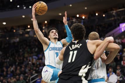 Jan 31, 2023; Milwaukee, Wisconsin, USA;  Charlotte Hornets guard LaMelo Ball (1) shoots during the third quarter against the Milwaukee Bucks at Fiserv Forum. Mandatory Credit: Jeff Hanisch-USA TODAY Sports