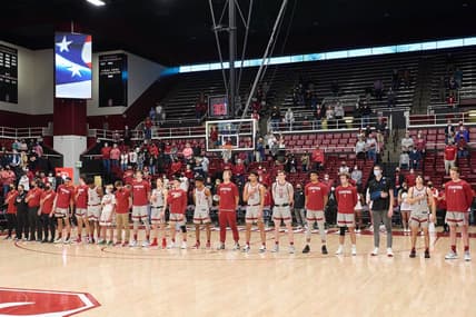 Feb 6, 2022; Stanford, California, USA;  The Stanford Cardinal men's basketball team stands for the national anthem before a game against the Washington Huskies at Maples Pavilion. Mandatory Credit: Robert Edwards-USA TODAY Sports