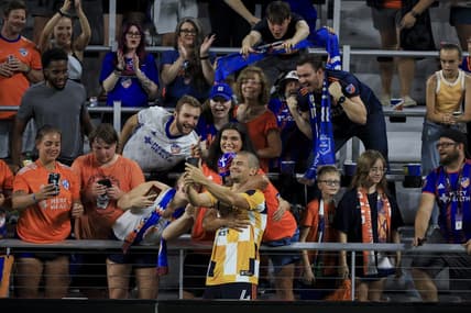 Sep 10, 2022; Cincinnati, Ohio, USA; FC Cincinnati defender Nick Hagglund (4) celebrates with fans after defeating the San Jose Earthquakes at TQL Stadium. Mandatory Credit: Aaron Doster-USA TODAY Sports