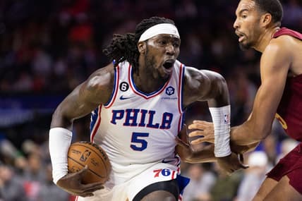 Oct 5, 2022; Philadelphia, Pennsylvania, USA; Philadelphia 76ers guard Julian Champagnie (5) drives against Cleveland Cavaliers forward Isaiah Mobley (15) during the third quarter at Wells Fargo Center. Mandatory Credit: Bill Streicher-USA TODAY Sports