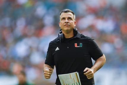 Oct 22, 2022; Miami Gardens, Florida, USA; Miami Hurricanes head coach Mario Cristobal runs on the field during the third quarter against the Duke Blue Devils at Hard Rock Stadium. Mandatory Credit: Sam Navarro-USA TODAY Sports