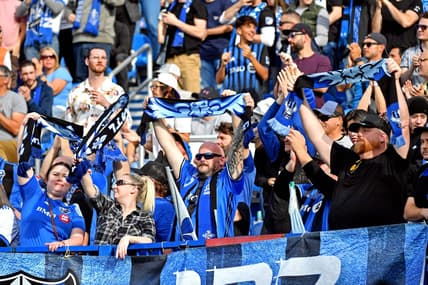 Oct 23, 2022; Montreal, Quebec, Canada; Fans cheer during the game between the CF Montreal and the New York City during the conference semifinals for the Audi 2022 MLS Cup Playoffs at Stade Saputo. Mandatory Credit: Marc DesRosiers-USA TODAY Sports