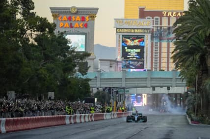Nov 5, 2022; Las Vegas, Nevada, USA;  Mercedes-AMG Petronas driver George Russell drives on the track during the Formula One Las Vegas Grand Prix Launch Party at Las Vegas Strip. Mandatory Credit: Ray Acevedo-USA TODAY Sports