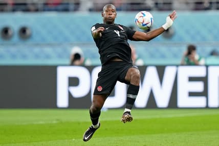 Nov 27, 2022; Doha, Qatar; (Editors Note: Caption Correction) Canada defender Kamal Miller (4) controls the ball against Croatia during the second half of a group stage match during the 2022 World Cup at Khalifa International Stadium. Mandatory Credit: Danielle Parhizkaran-USA TODAY Sports