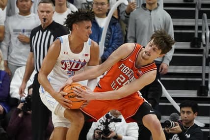 Jan 4, 2023; Evanston, Illinois, USA; Northwestern Wildcats guard Ty Berry (3) and Illinois Fighting Illini forward Matthew Mayer (24) battle for the ball during the first half at Welsh-Ryan Arena. Mandatory Credit: David Banks-USA TODAY Sports