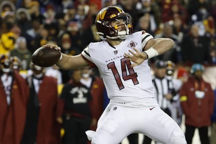Jan 8, 2023; Landover, Maryland, USA; Washington Commanders quarterback Sam Howell (14) passes the ball against the Dallas Cowboys at FedExField. Mandatory Credit: Geoff Burke-USA TODAY Sports