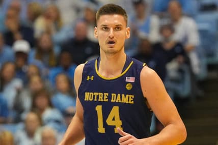 Jan 7, 2023; Chapel Hill, North Carolina, USA;  Notre Dame Fighting Irish forward Nate Laszewski (14) looks on against the North Carolina Tar Heels during the first half at Dean E. Smith Center. Mandatory Credit: James Guillory-USA TODAY Sports
