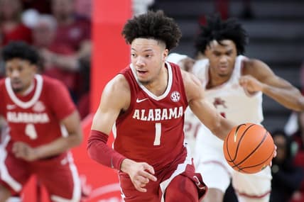 Jan 11, 2023; Fayetteville, Arkansas, USA; Alabama Crimson Tide guard Mark Sears (1) leads a fast break in the second half against the Arkansas Razorbacks at Bud Walton Arena. Alabama won 84-69. Mandatory Credit: Nelson Chenault-USA TODAY Sports
