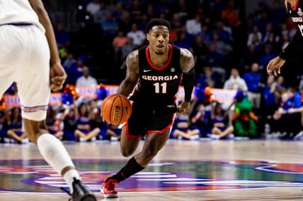 Jan 7, 2023; Gainesville, Florida, USA; Georgia Bulldogs guard Justin Hill (11) drives to the basket during the first half against the Florida Gators at Exactech Arena at the Stephen C. O'Connell Center. Mandatory Credit: Matt Pendleton-USA TODAY Sports