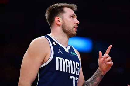 Jan 12, 2023; Los Angeles, California, USA; Dallas Mavericks guard Luka Doncic (77) reacts against the Los Angeles Lakers during the first half at Crypto.com Arena. Mandatory Credit: Gary A. Vasquez-USA TODAY Sports