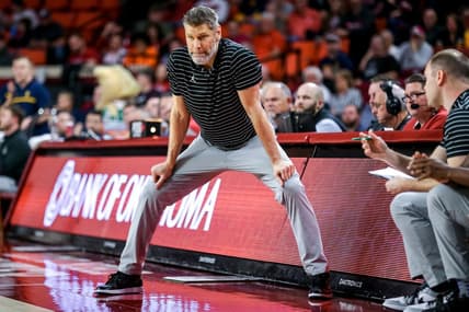 Oklahoma head coach Porter Moser stands on the sidelines in the second half during a college basketball game between the Oklahoma Sooners (OU) and the West Virginia Mountaineers at Lloyd Noble Center in Norman, Okla., Saturday, Jan. 14, 2023.

Ou Vs West Virginia
