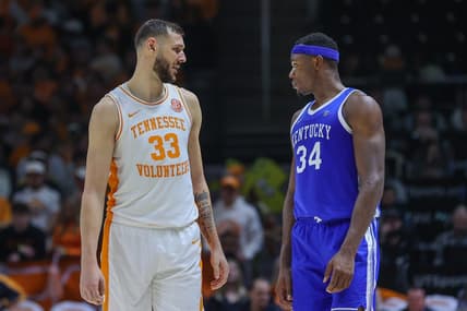 Jan 14, 2023; Knoxville, Tennessee, USA; Tennessee Volunteers forward Uros Plavsic (33) and Kentucky Wildcats forward Oscar Tshiebwe (34) during the second half at Thompson-Boling Arena. Mandatory Credit: Randy Sartin-USA TODAY Sports