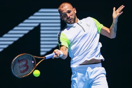 Jan 21, 2023; Melbourne, VICTORIA, Australia; Daniel Evans from Great Britain during his third round match against Andrey Rublev from Russia on day six of the 2023 Australian Open tennis tournament at Melbourne Park. Mandatory Credit: Mike Frey-USA TODAY Sports