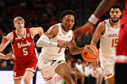 Jan 28, 2023; College Park, Maryland, USA; Maryland Terrapins guard Jahmir Young (1) splits Nebraska Cornhuskers defenders on the way to the basket during the second half at Xfinity Center. Mandatory Credit: Tommy Gilligan-USA TODAY Sports