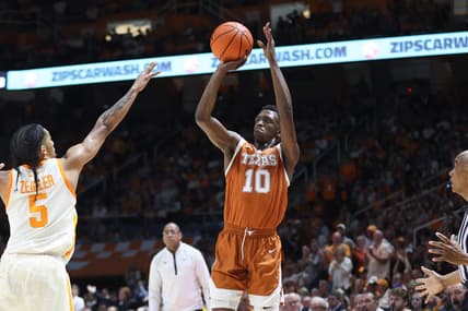 Jan 28, 2023; Knoxville, Tennessee, USA; Texas Longhorns guard Sir'Jabari Rice (10) shoots the ball against Tennessee Volunteers guard Zakai Zeigler (5) during the second half at Thompson-Boling Arena. Mandatory Credit: Randy Sartin-USA TODAY Sports