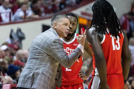 Jan 28, 2023; Bloomington, Indiana, USA; Ohio State Buckeyes head coach Chris Holtmann talks to players in the first half against the Indiana Hoosiers at Simon Skjodt Assembly Hall. Mandatory Credit: Trevor Ruszkowski-USA TODAY Sports