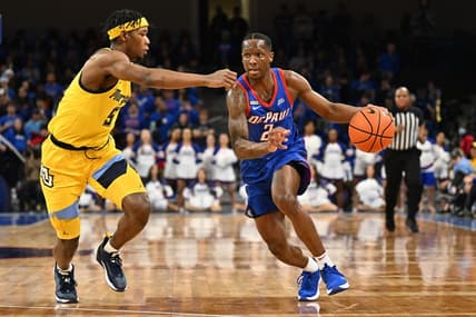 Jan 28, 2023; Chicago, Illinois, USA;  DePaul Blue Demons guard Umoja Gibson (2) controls the ball against the Marquette Golden Eagles at Wintrust Arena. Marquette defeated DePaul 89-69. Mandatory Credit: Jamie Sabau-USA TODAY Sports