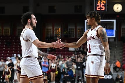 Jan 31, 2023; Chestnut Hill, Massachusetts, USA; Boston College Eagles guard Jaeden Zackery (3) reacts with guard Makai Ashton-Langford (11) during a timeout in first half of a game against the Clemson Tigers at the Conte Forum. Mandatory Credit: Brian Fluharty-USA TODAY Sports