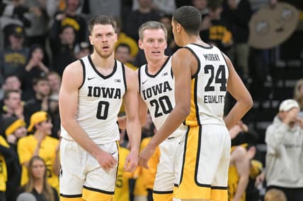 Jan 31, 2023; Iowa City, Iowa, USA; Iowa Hawkeyes forward Filip Rebraca (0) and forward Payton Sandfort (20) and forward Kris Murray (24) react during the second half against the Northwestern Wildcats at Carver-Hawkeye Arena. Mandatory Credit: Jeffrey Becker-USA TODAY Sports