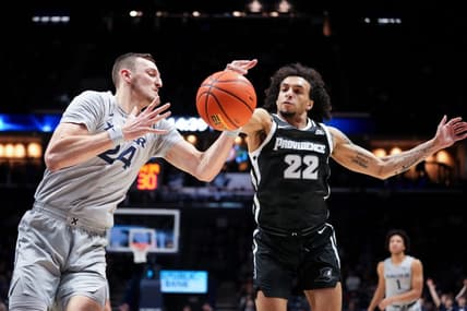 Xavier Musketeers forward Jack Nunge (24) and Providence Friars guard Devin Carter (22) compete for a rebound in the first half of a college basketball game between the Providence Friars and the Xavier Musketeers, Wednesday, Feb. 1, 2023, at Cintas Center in Cincinnati.

Providence Friars At Xavier Musketeers Feb 1 0041