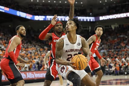Feb 1, 2023; Auburn, Alabama, USA;  Auburn Tigers guard Allen Flanigan (22) goes for a shot against the Georgia Bulldogs during the second half at Neville Arena. Mandatory Credit: John Reed-USA TODAY Sports