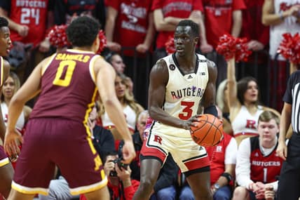 Feb 1, 2023; Piscataway, New Jersey, USA; Rutgers Scarlet Knights forward Mawot Mag (3) is defended by Minnesota Golden Gophers guard Taurus Samuels (0) during the first half at Jersey Mike's Arena. Mandatory Credit: Vincent Carchietta-USA TODAY Sports