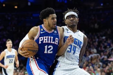 Feb 1, 2023; Philadelphia, Pennsylvania, USA; Philadelphia 76ers forward Tobias Harris (12) drives with the ball against Orlando Magic center Wendell Carter Jr. (34) during the third quarter at Wells Fargo Center. Mandatory Credit: Bill Streicher-USA TODAY Sports