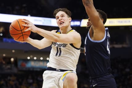 Feb 1, 2023; Milwaukee, Wisconsin, USA;  Marquette Golden Eagles guard Tyler Kolek (11) shoots against Villanova Wildcats forward Eric Dixon (43) during the second half at Fiserv Forum. Mandatory Credit: Jeff Hanisch-USA TODAY Sports
