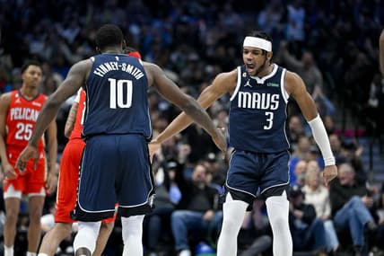 Feb 2, 2023; Dallas, Texas, USA; Dallas Mavericks forward Dorian Finney-Smith (10) and guard Jaden Hardy (3) celebrate during the first half of the game against the New Orleans Pelicans at the American Airlines Center. Mandatory Credit: Jerome Miron-USA TODAY Sports